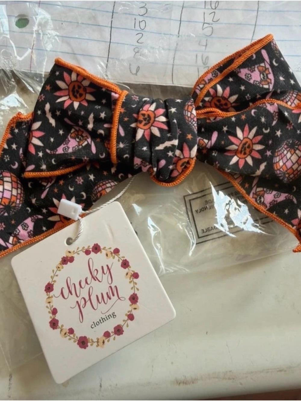 cheeky plum Black Bow Headband with Pink Sunflower Print and Orange Trim